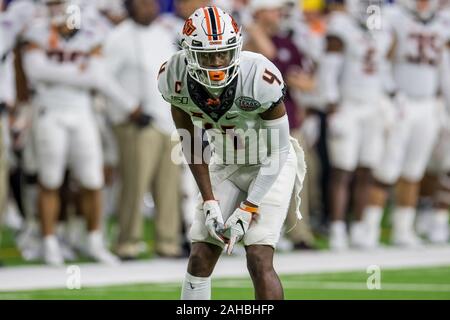 Dezember 27, 2019: Oklahoma State Cowboys cornerback A.J. Grün (4) Während des 3. Quartals der Texas Schüssel NCAA Football Spiel zwischen der Texas A&M Aggies und Oklahoma State Cowboys an NRG Stadion in Houston, TX. Texas A&M gewonnen 24. bis 21. Trask Smith/CSM Stockfoto