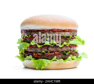 Vier Rindfleischpastetchen doppelte Größe Hamburger als ein Konzept der x2 deal Stockfoto