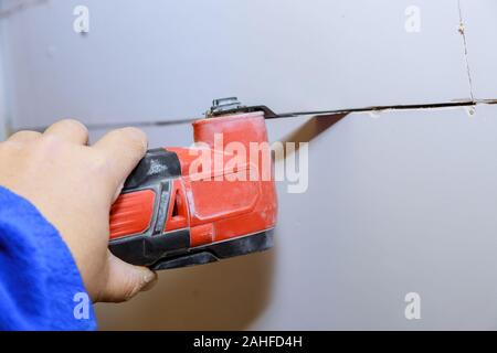 Wand schneiden Schnurlose oszillierende multi Funktion Power Tool Stockfoto