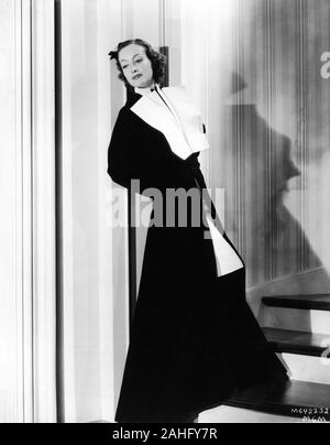 JOAN CRAWFORD 1934 Fashion Porträt im Kleid von Gilbert Adrian Werbung für VERLASSEN ALLE ANDEREN Direktor 1934 W.S. Van Dyke Metro Goldwyn Mayer Stockfoto