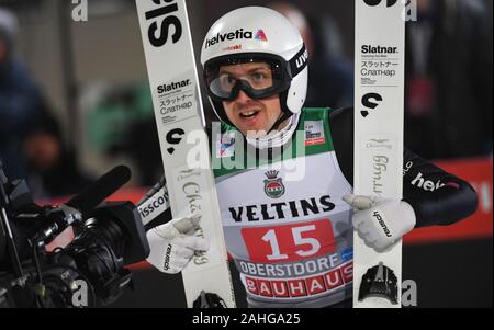 Oberstdorf, Deutschland. 29 Dez, 2019. Ski Nordisch/Skispringen: Weltcup, Vierschanzentournee, Big Hill, Männer, 2. , Skispringer Simon Ammann aus der Schweiz, reagiert auf Springen. Quelle: Angelika Warmuth/dpa/Alamy leben Nachrichten Stockfoto