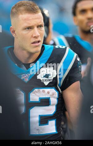 Charlotte, NC, USA. 29 Dez, 2019. Carolina Panthers zurück läuft, Christian McCaffrey (22) in der Bank während der NFL matchup an der Bank von Amerika Stadium in Charlotte, NC. (Scott Kinser/Cal Sport Media). Credit: Csm/Alamy leben Nachrichten Stockfoto