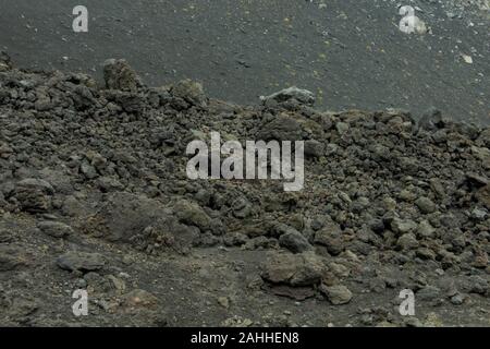 Hintergrund der Steine auf den schwarzen Boden der Lava einen Vulkan Ätna Stockfoto