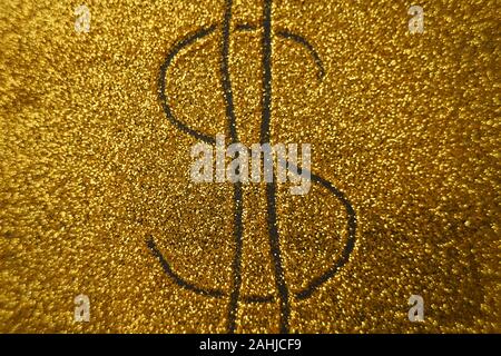 Dollarzeichen auf gold glänzenden Hintergrund Stockfoto