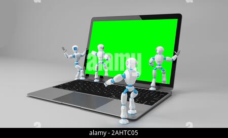Roboter wandern in den Laptop Green Screen. Stockfoto