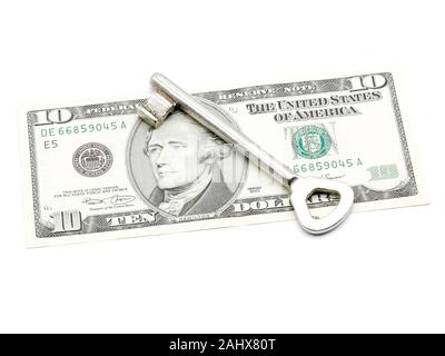 Business Konzept: Alte Schlüssel liegen auf einem 10 Dollar Banknote, isoliert auf weißem Hintergrund Stockfoto