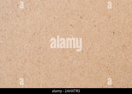 Hellbraun Geschenkpapier. Natürliche Blatt Oberfläche, Verpackung Hintergrund. Textur aus Karton, Pappe, steifes Papier Stockfoto