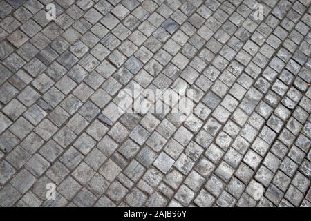 Graue Ziegel Stein Straße Straße. Stockfoto