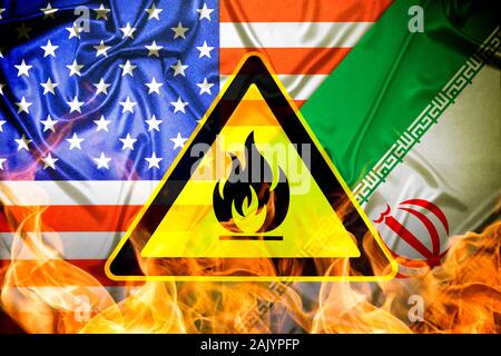 Warnzeichen vor Flaggen des Iran und der USA, US-Iran-konflikt Stockfoto