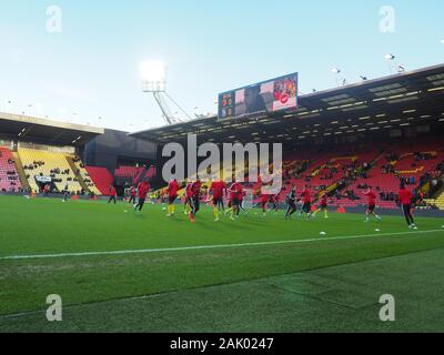 Watford Spieler Aufwärmen vor dem FA Cup Spiel vs Tranmere Rovers Stockfoto