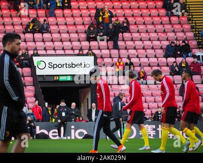 Watford Spieler Aufwärmen vor dem FA Cup Spiel vs Tranmere Rovers Stockfoto