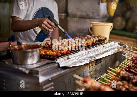 Street Food Künstlers zu einem Night Market in Bangkok, Thailand. Stockfoto