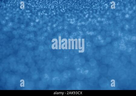 Verschwommen abstrakt Hintergrund mit Unkonzentrierten Blau Pailletten Stockfoto