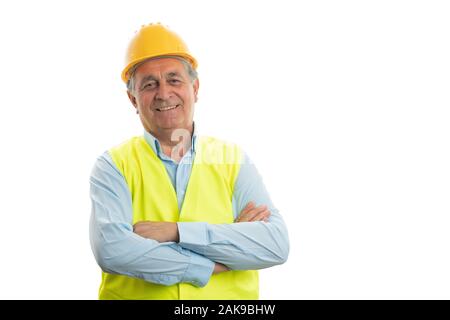 Portrait von alten builder Mann mit verschränkten Armen auf weißem studio Hintergrund isoliert Stockfoto