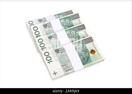 Bundles der polnischen 100 zloty Banknoten Ansicht von oben. Auf weiß isoliert. Pfad enthalten. Stockfoto