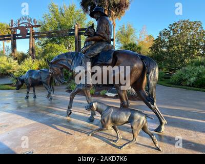 Bronzestatue Pferd cowboy Hund Stockfoto