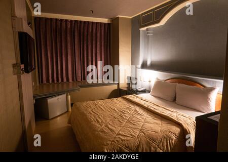 Ein Doppelzimmer im low budget Tie Dao Hotel, Tainan City, Taiwan Stockfoto