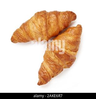 Zwei Croissants auf weißem Hintergrund. Ansicht von oben. Stockfoto