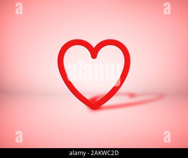 Rotes Herz auf pinkfarbenem Hintergrund. Romantisches Symbol für Liebe und Valentinstag. Stockfoto