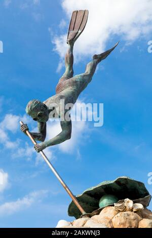 Mexiko, Nayarit, Bucerias, die Skulptur ist die Abbildung eines Mannes tauchen eine Auster mit einer Bar zu lösen. Das Gesicht der Statue war altmodisch nach Th Stockfoto