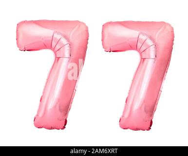Nummer 77 siebenundsiebzig von Rose Gold aufblasbare Ballons isoliert Auf weißem Hintergrund Stockfoto