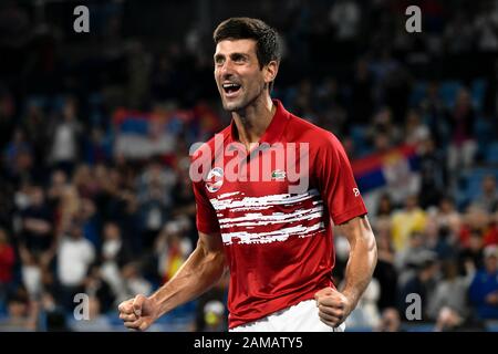 Januar 2020; Sydney Olympic Park Tennis Center, Sydney, New South Wales, Australien; ATP Cup Australien, Sydney, Tag 10; Serbien gegen Spanien; Novak Djokovic aus Serbien reagiert, nachdem Serbien sein Doppelspiel gegen das Team Spanien gewonnen hat, um den ATP-Cup zu gewinnen - redaktionelle Verwendung Stockfoto