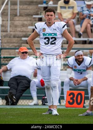 DeLand, FL, USA. Januar 2020. American Team Punter Michael Farkas (32) während College Football All Star Game im SPIRAL Tropical Bowl zwischen American (White) und National (Black0 im Spec Martin Stadium in DeLand, Fl. Romeo T Guzman/CSM/Alamy Live News Stockfoto