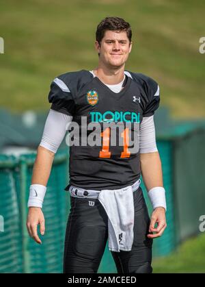 DeLand, FL, USA. Januar 2020. Nationalmannschafts-Quarterback Alex Hornibrook (11) während College Football All Star Game im SPIRAL Tropical Bowl zwischen American (White) und National (Black0 im Spec Martin Stadium in DeLand, Fl. Romeo T Guzman/CSM/Alamy Live News Stockfoto