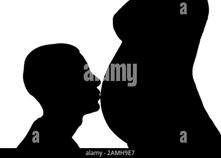 Mann küsst die werdende Frau (Bild im Schatten) Stockfoto