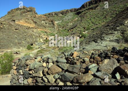 Archäologische Zone Canada de los Gatos mit Resten prahispanischer Häuser, Puerto de Mogan, Gran Canaria, Kanaren, Spanien, Stockfoto