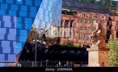 Die Skulptur vor der Unimontagehalle mit Blick auf die neue Bibliothek, zwölf Jahre nach Planungsbeginn und nach fast sieben Jahren Abriss und Bau - wurde im Juli 2015 die neue Universitätsbibliothek (UB) eröffnet, die vom Architekten Heinrich Degelo entworfen wurde. 02.10.2015 [automatisierte Übersetzung] Stockfoto