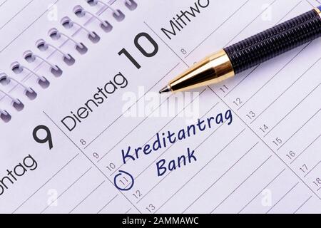 Kredit und Bank als Eintrag im Terminkalender [automatisierte Übersetzung] Stockfoto