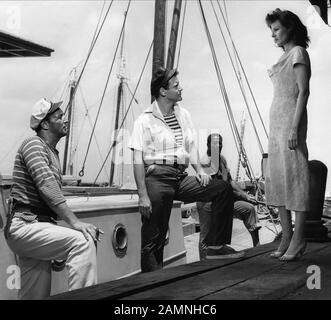 MITCHELL, LEMMON, HAYWORTH, FEUER UNTEN, 1957 Stockfoto