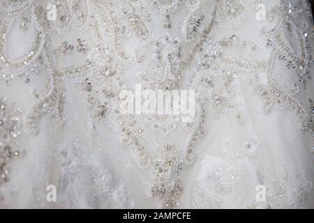 Nahaufnahme der Spitze am ein Brautkleid. Stockfoto