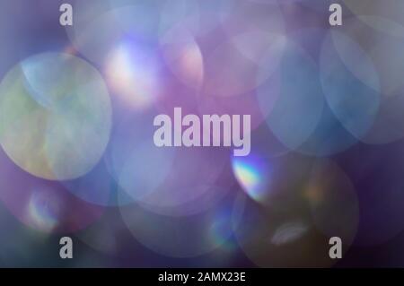 Abstrakt verschwommene glänzende Glimmerlampe leuchtet Hintergrund. Abstrakte, verschwommene Lichter. Stockfoto