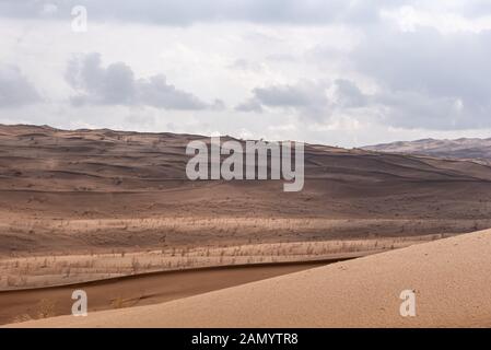 Die Form der Sanddünen in der Wüste Lut Stockfoto