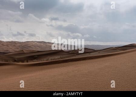 Die Form der Sanddünen in der Wüste Lut Stockfoto