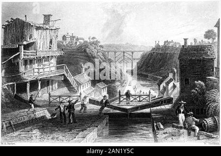 Eine Gravur von Lockport, Erie Canal, NY State USA, mit hoher Auflösung gescannt. Aus einem Buch, das 1840 gedruckt wurde. Glaubte, dass es keine Urheberrechte gibt Stockfoto