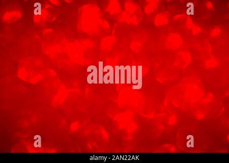 Unscharfer Hintergrund rot mit Holiday bokeh, abstrakt. Valentinstag Stockfoto
