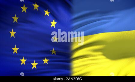 Europäischen Union und der Ukraine flags Hintergrund, diplomatischen und wirtschaftlichen Beziehungen Stockfoto