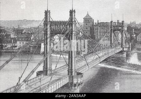 Die Franz-Joseph-Brücke, später in Stefanikbrücke umbenannt, war eine Hängebrücke über die Vltava in Prag, die im Jahre 1868 eröffnet wurde / die Franz-Joseph-Brücke, später in Stefanik-Brücke umbenannt, war eine Eröffnete Hängebrücke über die Moldauer in Prag, historisch, Digitale verbesserte Wiedergabe eines Originals aus dem 19. Jahrhundert / Digitale Produktion einer Originalanlage aus dem 19. Jahrhunderts Stockfoto