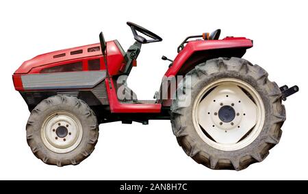 Rote Traktor auf weißem Hintergrund Stockfoto