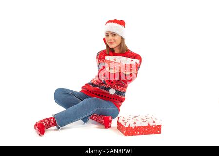 Junge Frau mit einem Weihnachtsmann, ein auf weißem Hintergrund Stockfoto