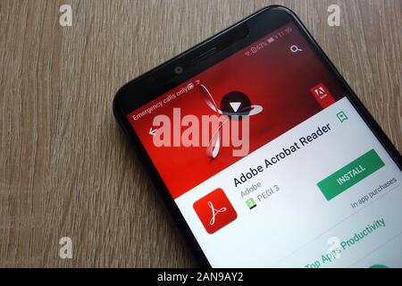 Adobe Acrobat Reader App auf der Google Play Store-Website auf einem modernen Smartphone angezeigt Stockfoto