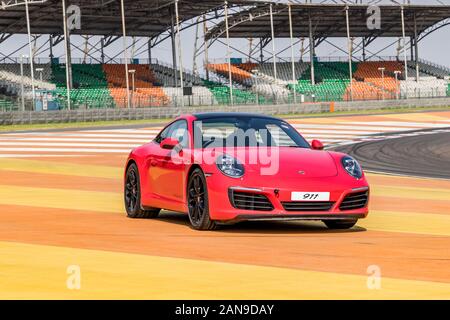 Luxus Autos von Porsche im Buddh International Circuit, Greater Noida, Indien Stockfoto