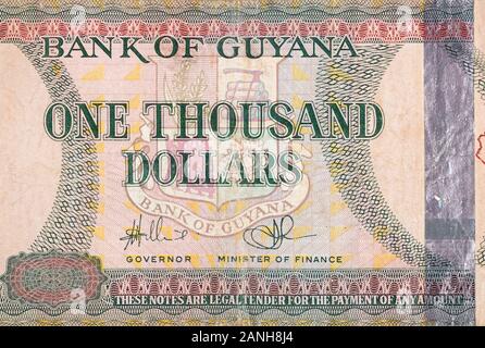 Teil von Braun Guyana 1000 Dollar Banknote fragment Nahaufnahme Stockfoto