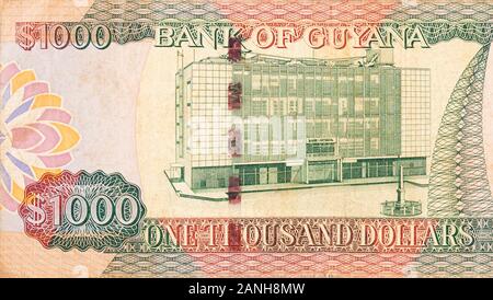 Teil von Braun Guyana 1000 Dollar Banknote fragment Nahaufnahme Stockfoto