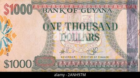 Teil von Braun Guyana 1000 Dollar Banknote fragment Nahaufnahme Stockfoto