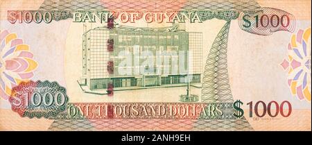 Teil von Braun Guyana 1000 Dollar Banknote fragment Nahaufnahme Stockfoto