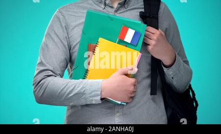 Student Notebooks mit French Flag, internationale pädagogische Programm Stockfoto